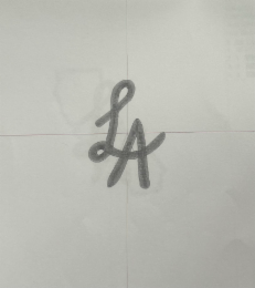 cursive la