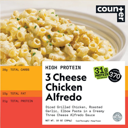 counter high protein 3 cheese chicken alfredo diced grilled chicken, roast garlic, elbow pasta in a creamy three cheese alfredo sauce net wt. 10 oz (284g) cook thoroughly · keep frozen 31 g protein per serving 370 calories per serving inspected for wholes