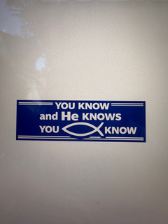 design plus words, letters, and/or numbers.  "you know and he knows you know" in blue and white with christian fish.