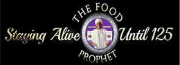the words "the food" on top of the central logo, the word "prophet" at the bottom of central logo, the words "staying alive" of the left side of the central logo, the words "until 125" on the right side of central logo, central logo with silver lining and