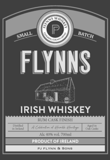flynn's whiskey cloghan, county offaly p small batch flynns irish whiskey rum cask finish distilled in ireland a celebration of humble heritage aged in oak casks alc 40% vol. 700ml product of ireland pj flynn & sons